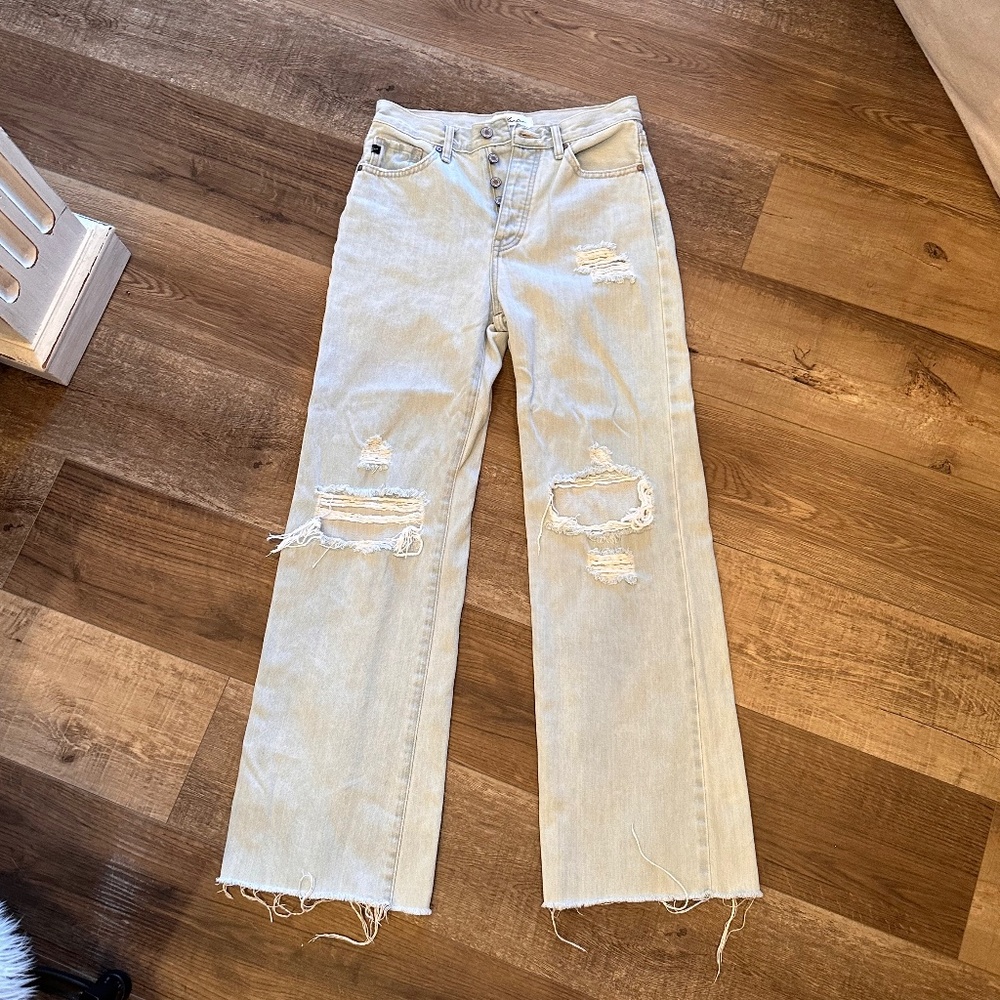 light wash button fly jeans